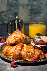 breakfast croissant jam and juice