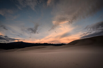 Sunset Lights High Clouds Above Sand Dunes