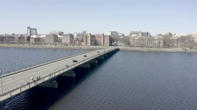 Harvard Bridge connecting  Boston to Cambridge. City skyline views of Massachusetts Institute of Technology