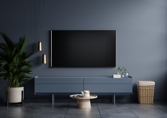 Modern interior of living room with tv on the cabinet on dark blue wall background. - obrazy, fototapety, plakaty