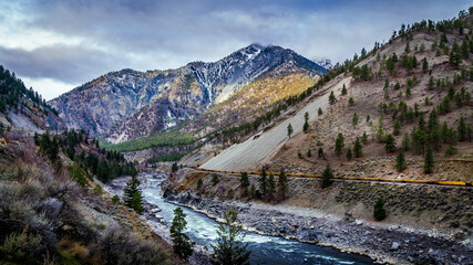 Fototapeta na wymiar The Thompson River as it flows through the Coastal Mountains along the Fraser Canyon Route of the Trans Canada Highway in British Columbia, Canada