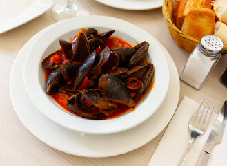 Popular Spanish delicacy with an exquisite taste of mussels a la Marinera, cooked in tomato sauce