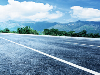 The high - speed mountain road stretches forward