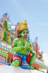 Hanuman statue on temple tower - Hindhu Deity	
