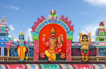 Narasimha avatar statue on temple tower - Lion headed God
