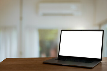 laptop with screen,office background for light bokeh.	