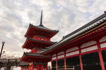 Sanjunotou (3 Store Pagoda) and old temple architectures at Kiyomizu-dera Temple Complex, Kyoto, Japan at the beautiful sunset moment.