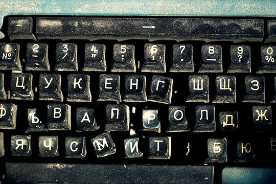 Keyboard with Russian letters of an old typewriter close-up.
