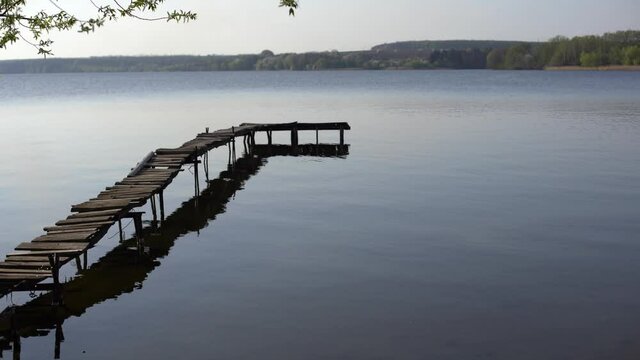 pier, wooden platform panton by the river.