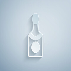Paper cut Champagne bottle icon isolated on grey background. Paper art style. Vector
