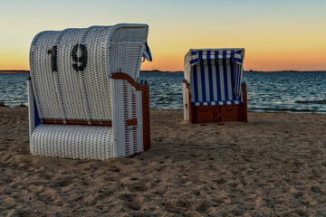 Evening at the Baltic Sea, with Beach chairs and the beach in Hohen Wieschendorf,...