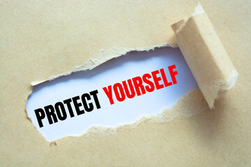 Text sign showing PROTECT YOURSELF