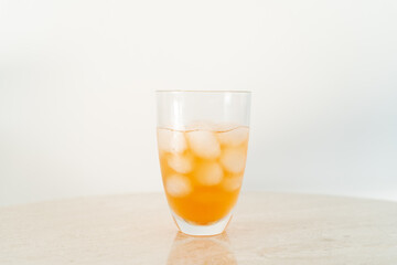 Orange juice in a glass with ice