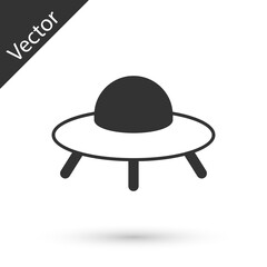 Grey UFO flying spaceship icon isolated on white background. Flying saucer. Alien space ship. Futuristic unknown flying object. Vector