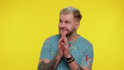 Sneaky cunning trendy stylish guy with tricky face gesticulating and scheming evil plan, thinking...