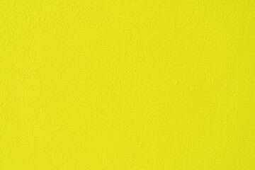 Yellow cement or concrete wall texture background.
