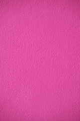 Pink cement wall texture for background and copy space for text. Pink paper background.