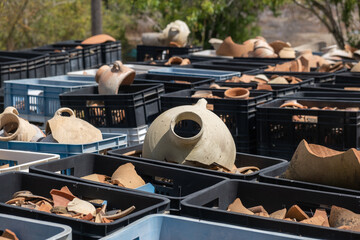 Remains of ancient clay jugs found in archaeological excavations