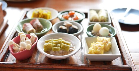 Selective focused set of dim sum and other delicacies, Chinese cuisine.