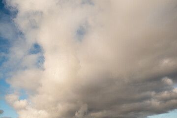 Fototapeta na wymiar Cloudy blue sky looks like smoke. Nature background