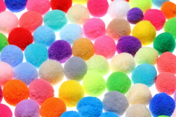 Closeup colorful Pompom in white background