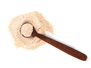 ground asafoetida in wooden spoon on white