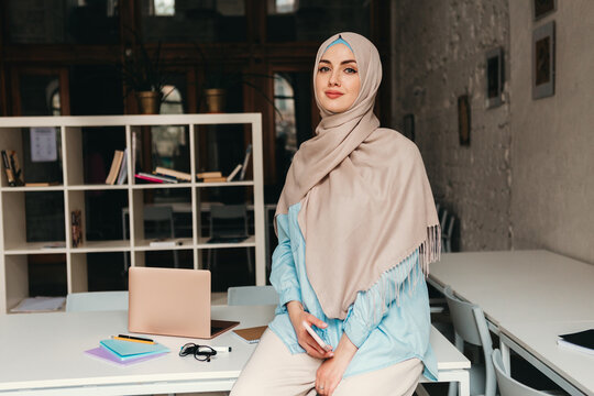 Modern Muslim Woman In Hijab In Office Room