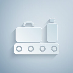 Paper cut Airport conveyor belt with passenger luggage, suitcase, bag, baggage icon isolated on grey background. Paper art style. Vector