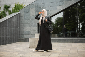 muslim woman in hijab in city street
