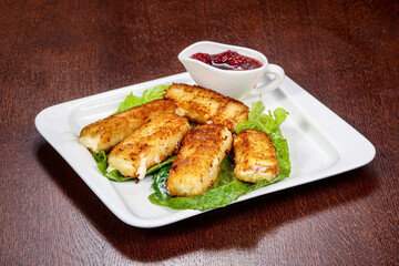 Fried cheese sticks with sauce