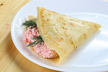 Pancake with crab and cream