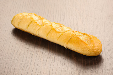 Crust tasty baguette over board