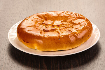 Tasty hot baked round pie