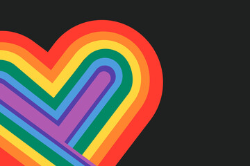 Rainbow heart LGBTQ pride month concept on black background - obrazy, fototapety, plakaty