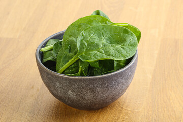 Fresh green spinach leaves in the bowl