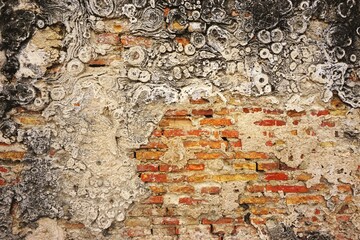 Ancient brick wall with limestone mineral deposit rock formations abstract horizontal background
