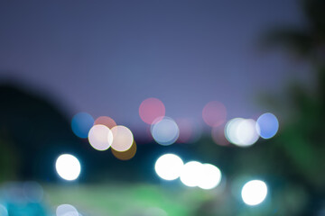 City lights blur abstract background with beautiful colorful bokeh