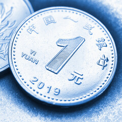 1 one Chinese yuan coin close-up. Light blue tinted square illustration about the economy, business, money and finance of China. Macro
