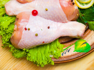 raw chicken legs with spices