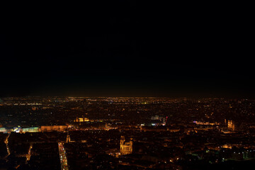 Aerial view of Paris in the night . France capital city in the nighttime . European big city in the night illumination