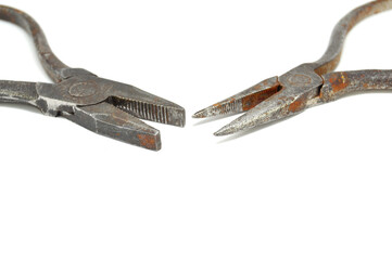 Old instrument on white background close-up. Vintage, equipment, technology, industry, locksmith 