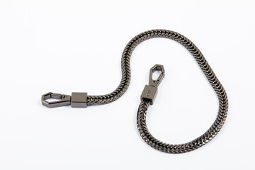 Black metal key chain on a white background