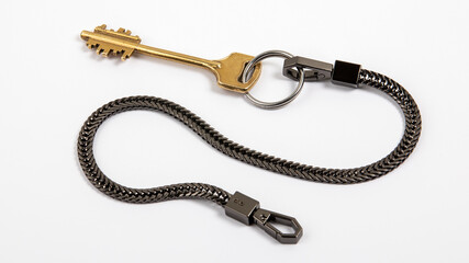 Home key with black metal chain. Horizontal banner