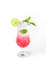 Strawberry soda, in a clear glass, With sliced ​​lime, and mint leaves, placed inside a clear glass put on white background.