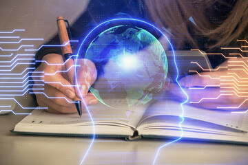 Multi exposure of woman hands working on computer and human brain hologram drawing. Ai tech concept.