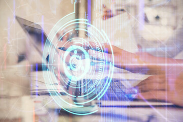 Obraz premium Multi exposure of woman hands working on computer and data theme hologram drawing. Tech concept.
