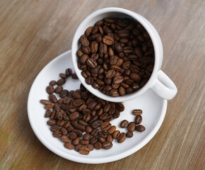 Fototapeta na wymiar Coffee beans on a cup