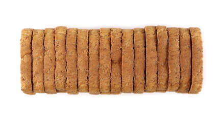 Wholemeal crackers, bread rusks pile, toast slices isolated on white background, top view