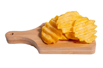 Fluted potato chips on a wooden board close up isolated on a white background