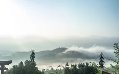 Crédence de cuisine en verre imprimé Forêt dans le brouillard Beautiful view of local valley and mountain in misty near "Linh Quy Phap An" pagoda, Bao Loc town, Lam Dong Province, Vietnam.